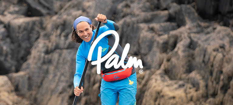 man paddle boarding in Palm equipment gear